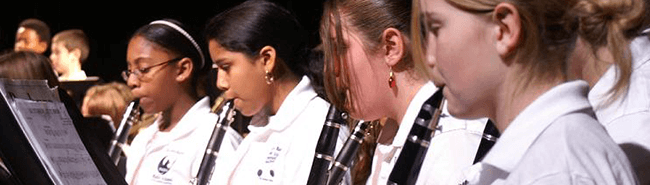 students in school band playing clarinet